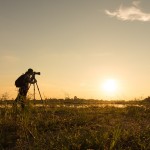 Fotograf bei Sonnenuntergang